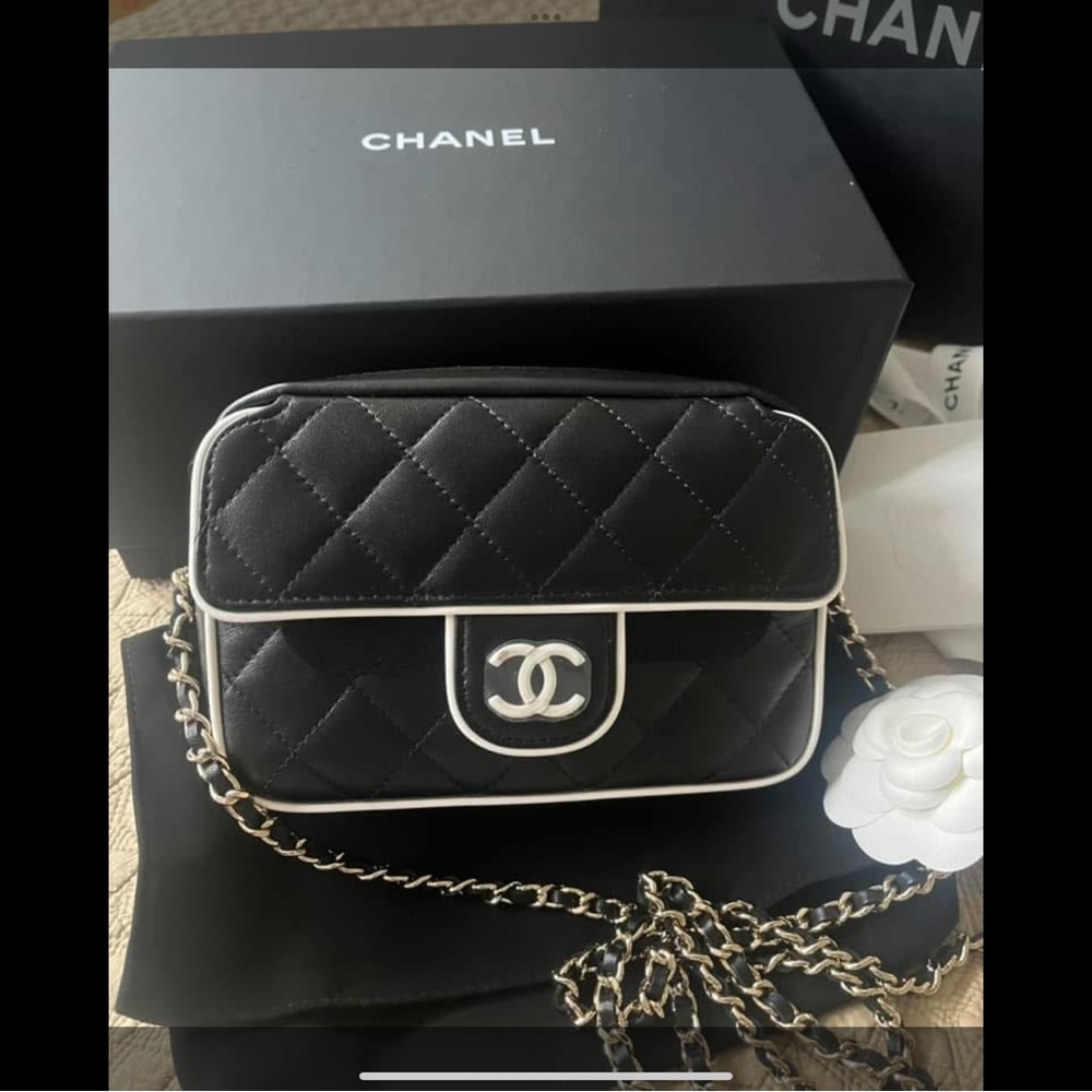 CHANEL Caviar Quilted Chain Melody Camera Bag in black with white resin CC